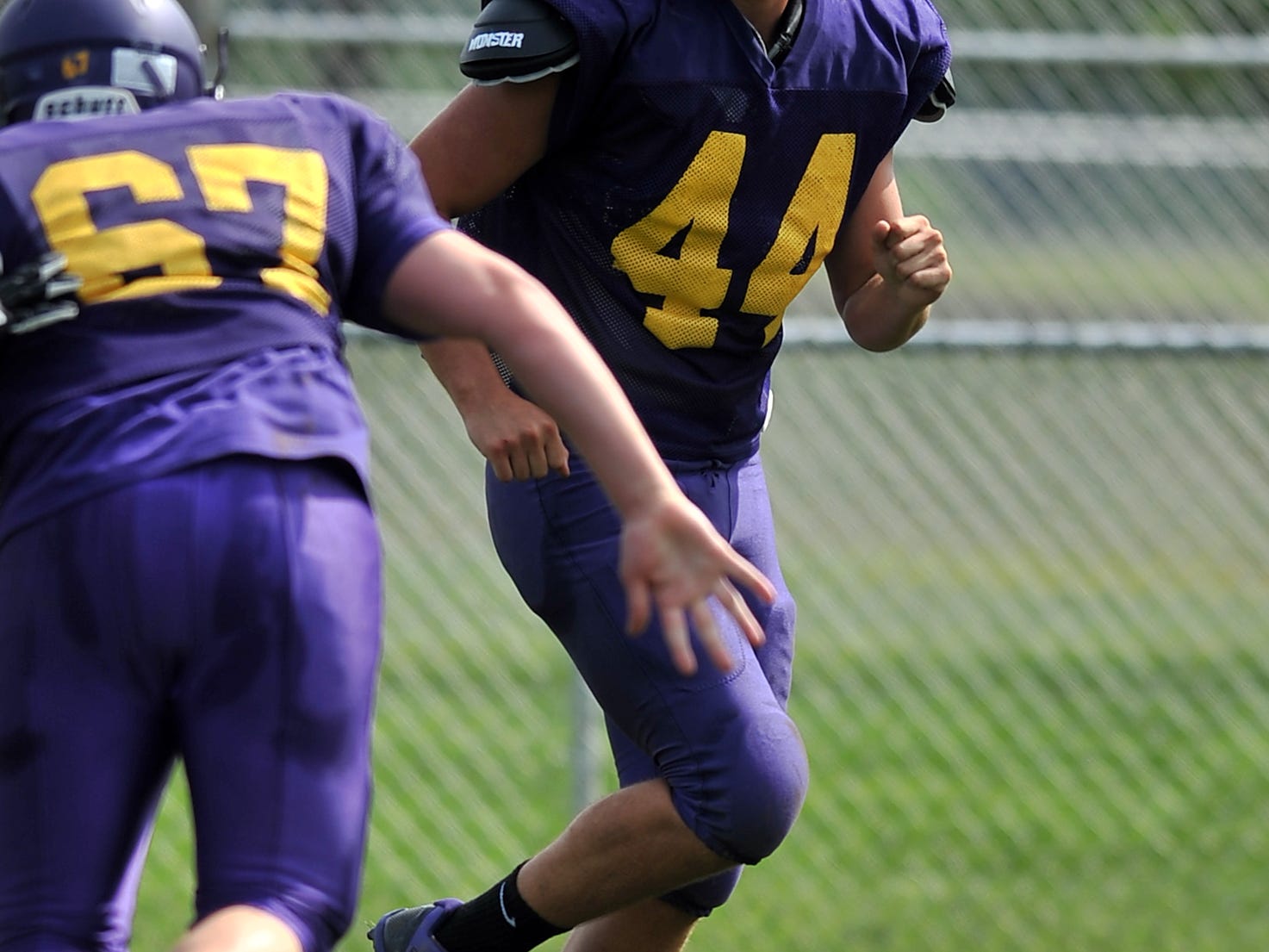 TOP: Bloom-Carroll’s Taylor Ball runs a drill during an Aug. 7 practice.