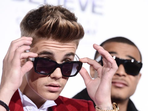 Singer Justin Bieber checks out the scene at the premiere of his documentary biopic 