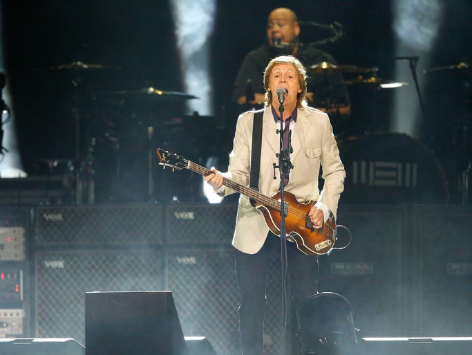 Paul McCartney performs during his 'Out There' world tour Tuesday, Aug. 12,  2014 at US Airways Center in Phoenix, Arizona.