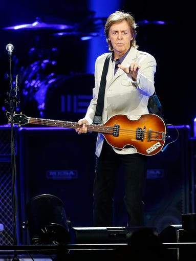 Paul McCartney performs during his 'Out There' world tour Tuesday, Aug. 12,  2014 at US Airways Center in Phoenix, Arizona.