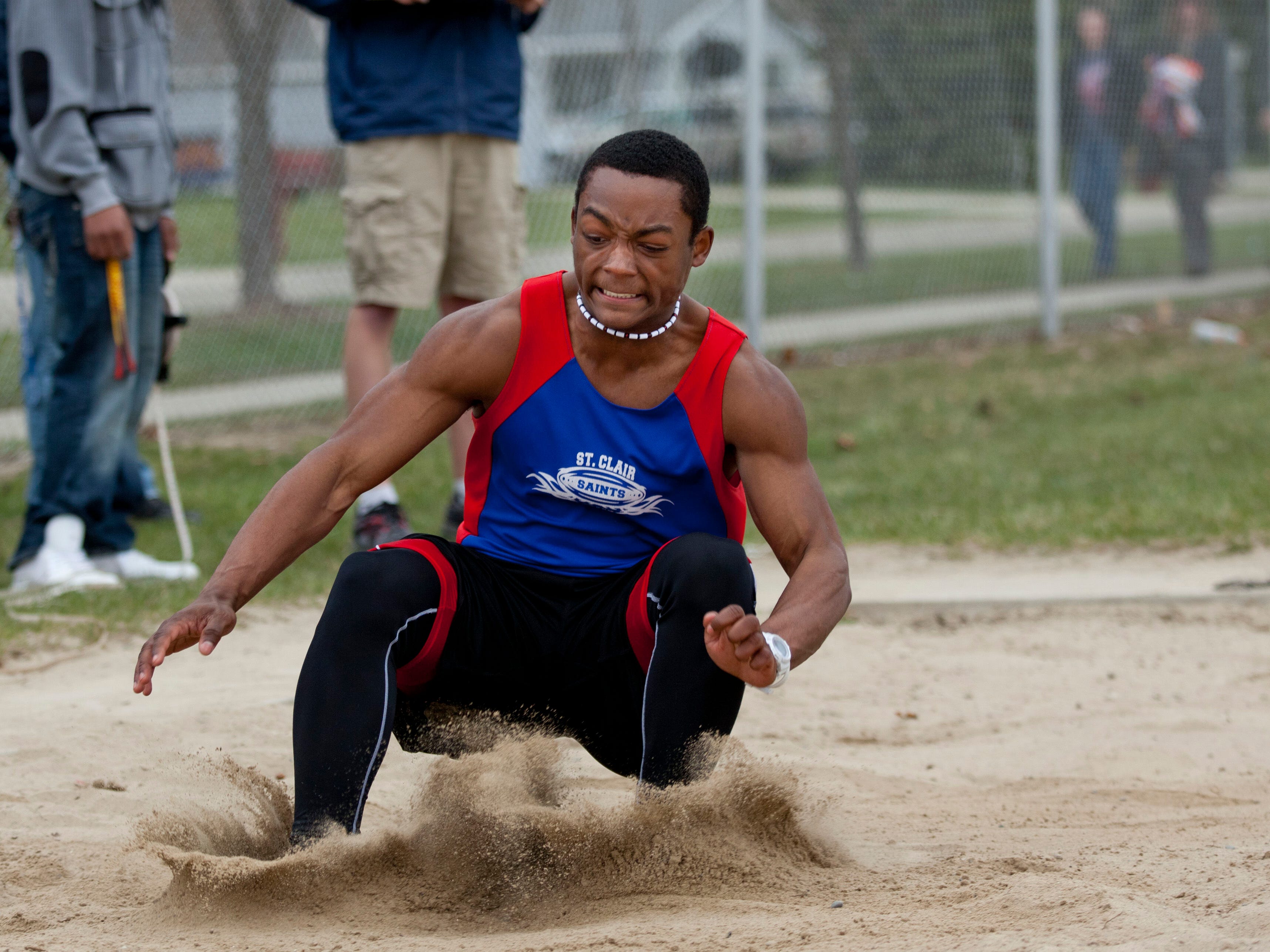 St. Clair sophomore Cameron Williams competes in the long jump during a track meet Thursday, April 30, 2015 at Marysville High School.