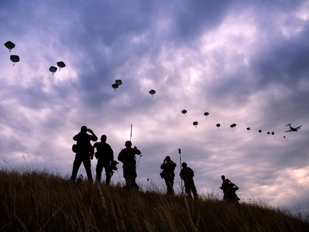 NATO paratroopers drop out of a U.S. Air Force C-130 Hercules during Swift Response 17 joint airborne military exercise at Bezmer Airfield near the village of Bezmer, Bulgaria. \u000dThe U.S. led exercise is part of Saber Guardian 2017 which involves