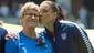 Hope Solo (1, right) kisses her mom Judy Solo (left)