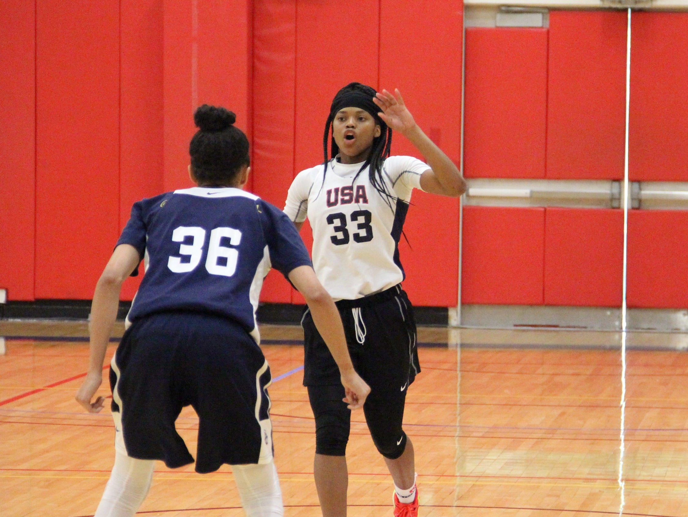 Fort Myers sophomore Destanni Henderson runs the USA women's basketball U17 offense during a practice in Colorado Springs, Colorado.