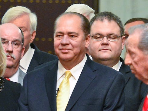 Gov. Earl Ray Tomblin pauses in the House of Delegates Chamber during the state of the state Wednesday evening.