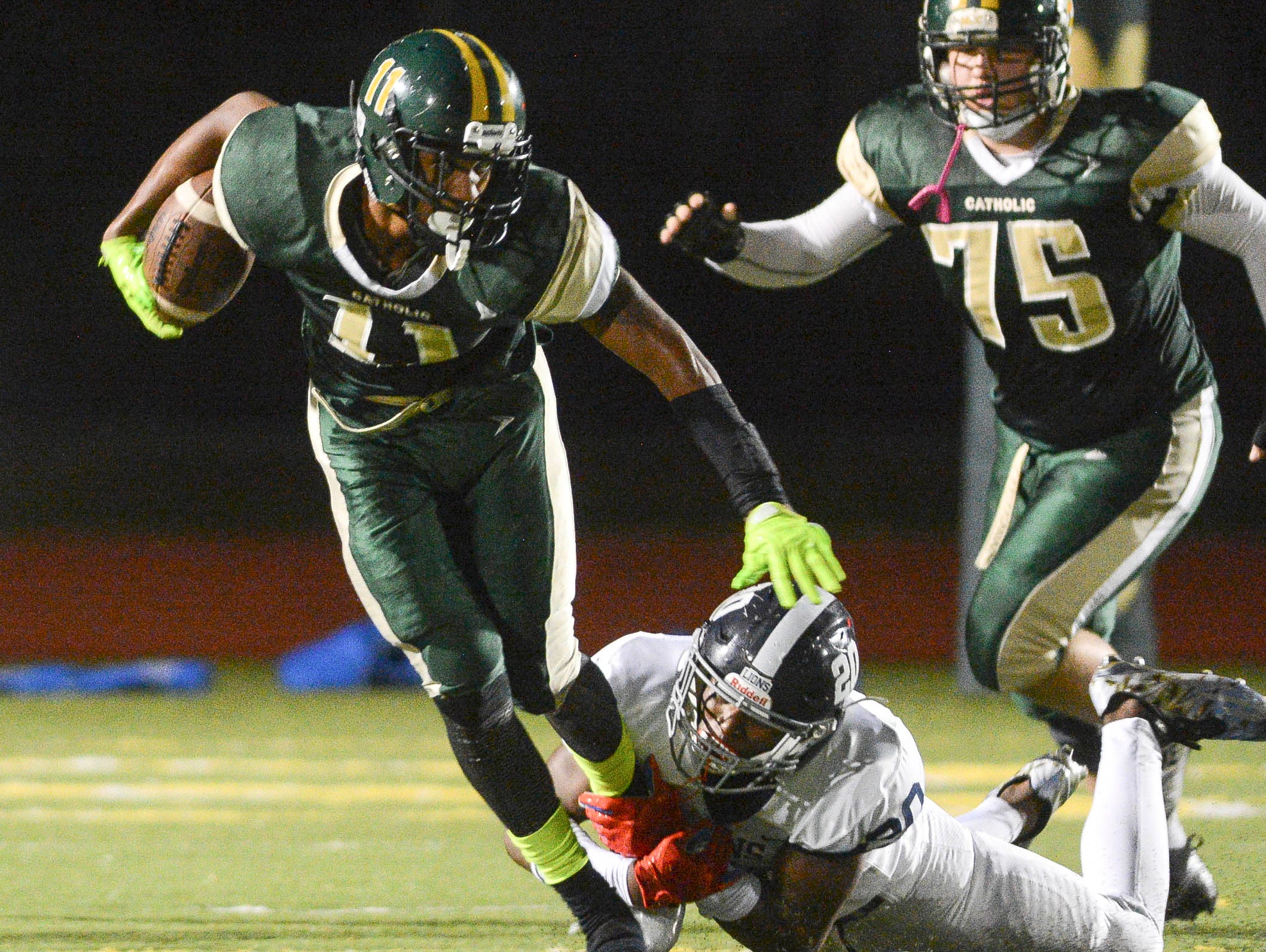 MCC's Lorenzo Hardy tries to get past Chaminade-Madonna defender Keontra Smith (20) during Friday's Class 3A semifinal.