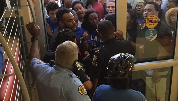 Police blocked about 50 protesters from entering the
