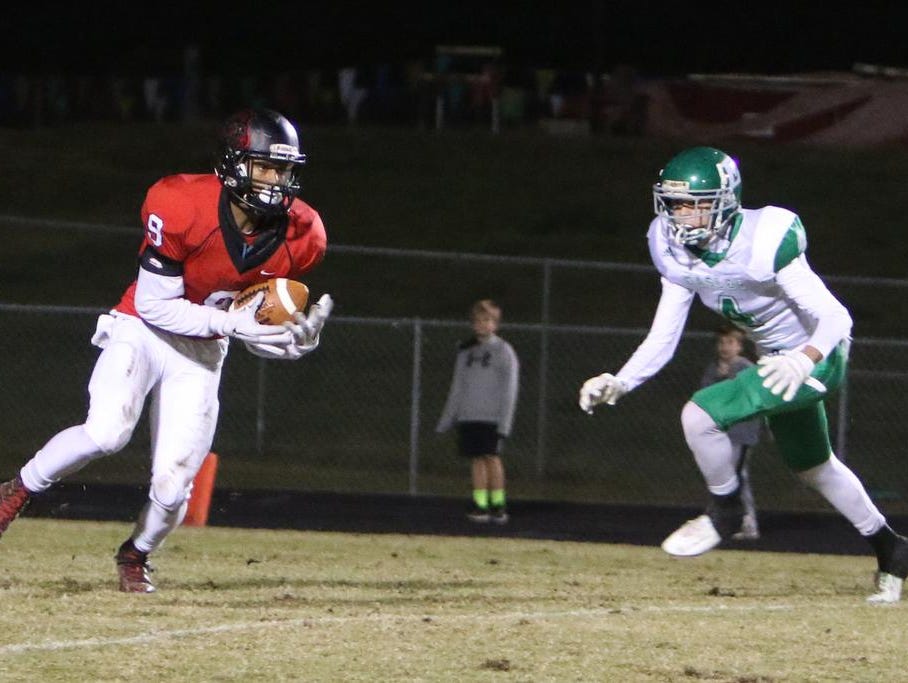 Hillcrest's Quentin Martin(9) brings down a pass from Hillcrest's Collin Sneed (12) for a touchdown.