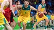 Matthew Dellavedova of Australia drives to the basket