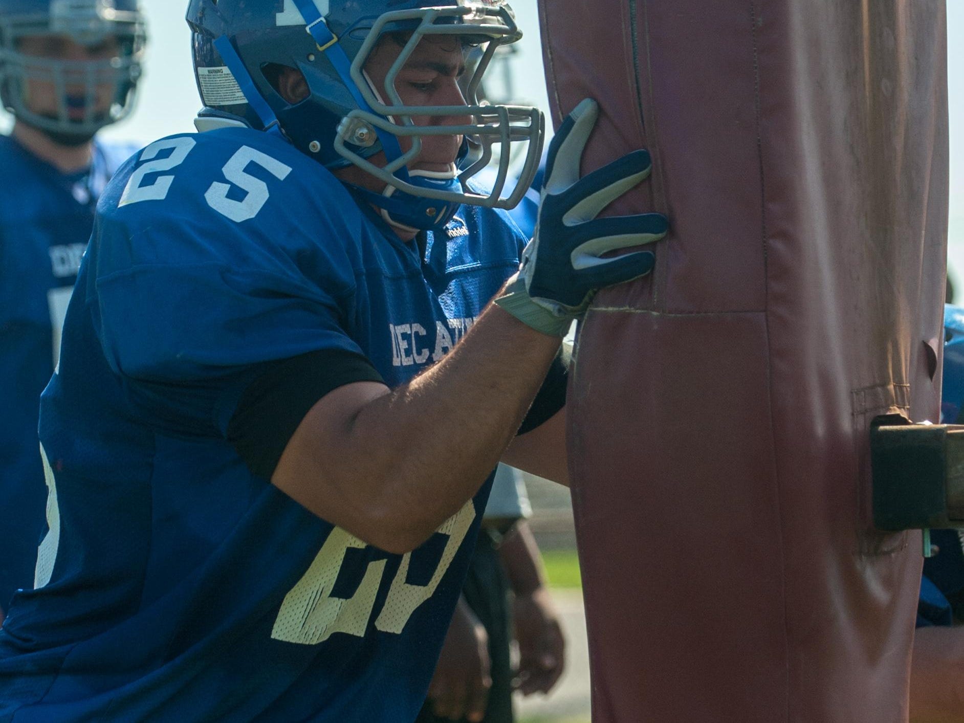 Stephen Decatur linemen work on their punch during practice on Friday morning in Berlin.