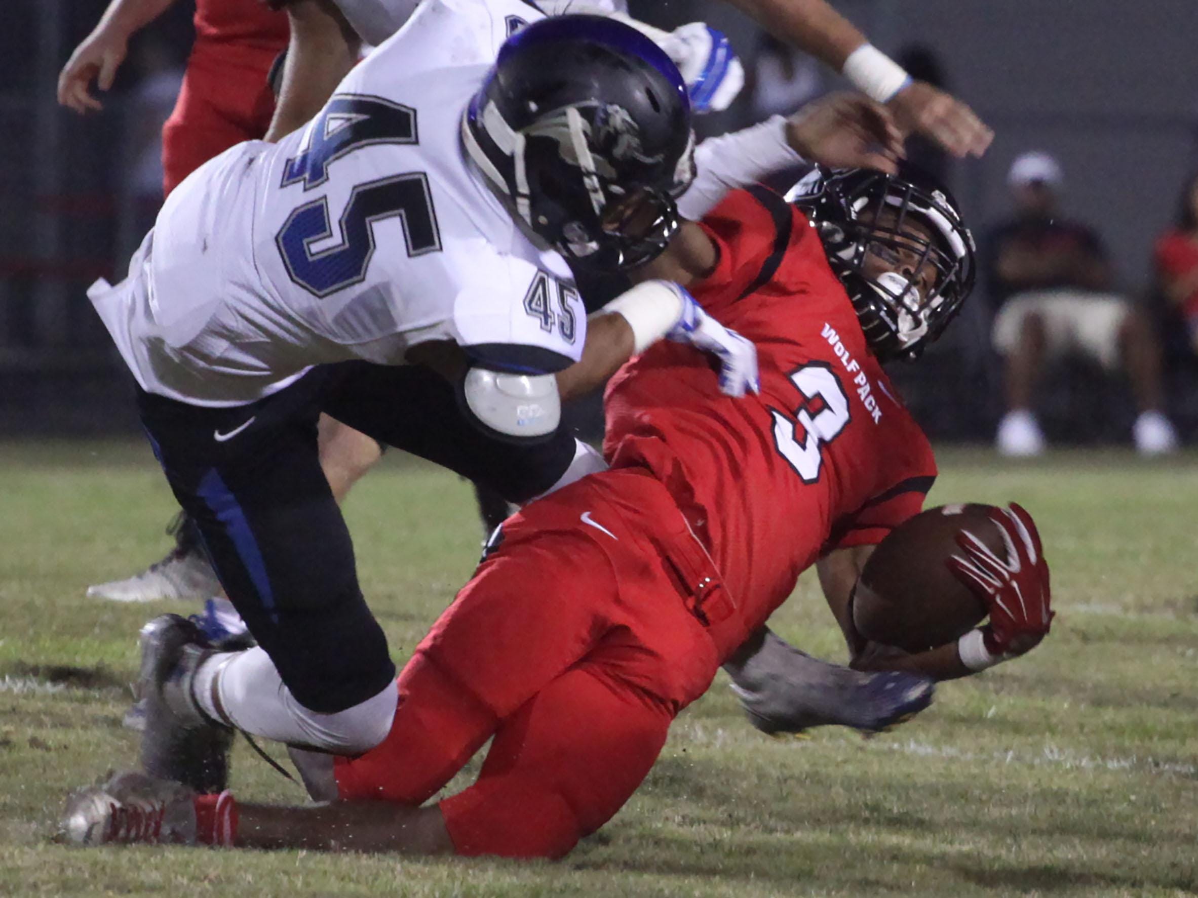 South Fort Myers’ Ke’Shon Murray is tackled by Ida Baker’s Robert Cobb during a game at South Fort Myers on Friday night.