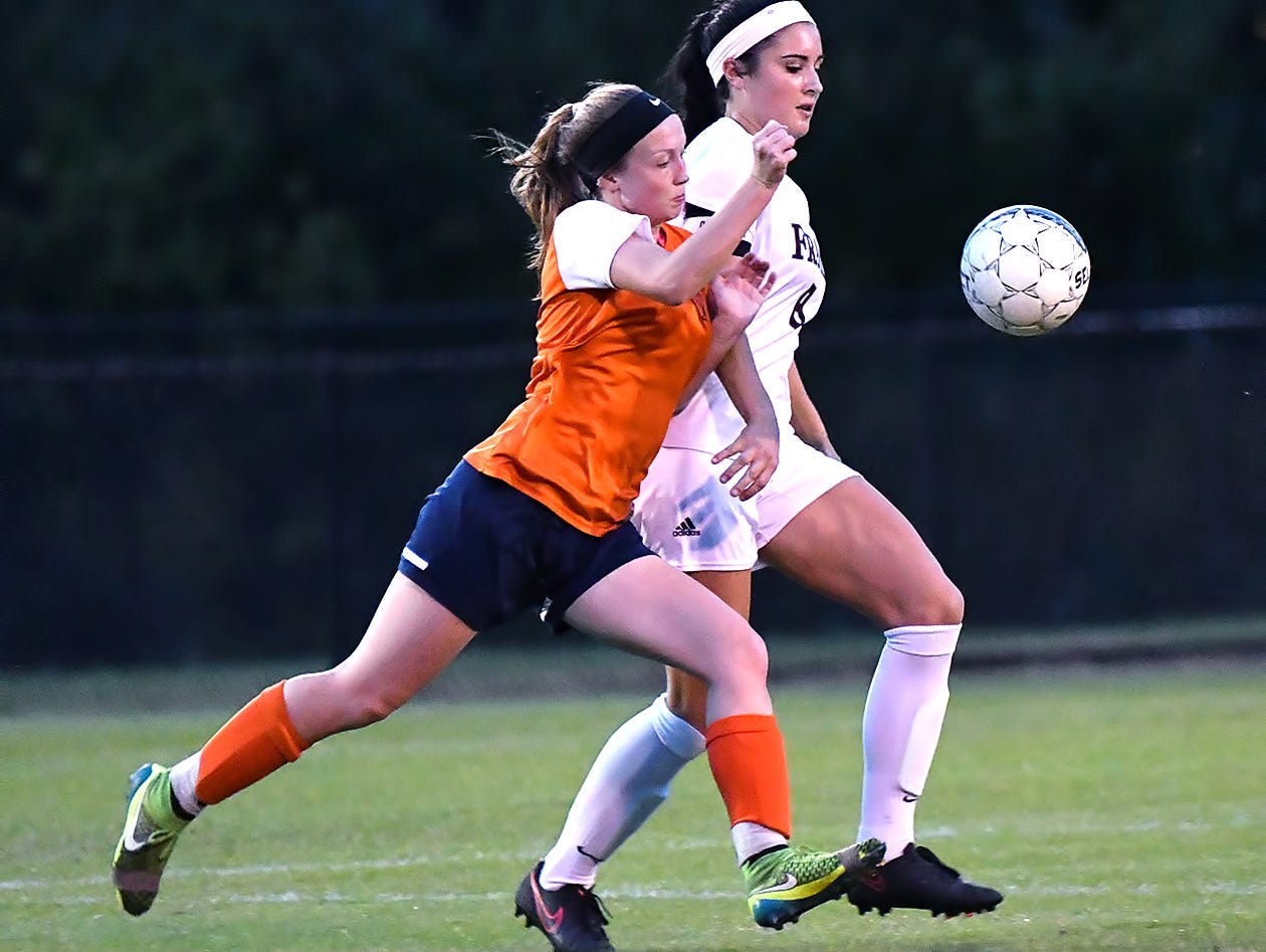 Franklin senior defender Madison Smith cuts off Dickson County's Kelsie Wall during the opening round of the District 11-AAA Tournament.