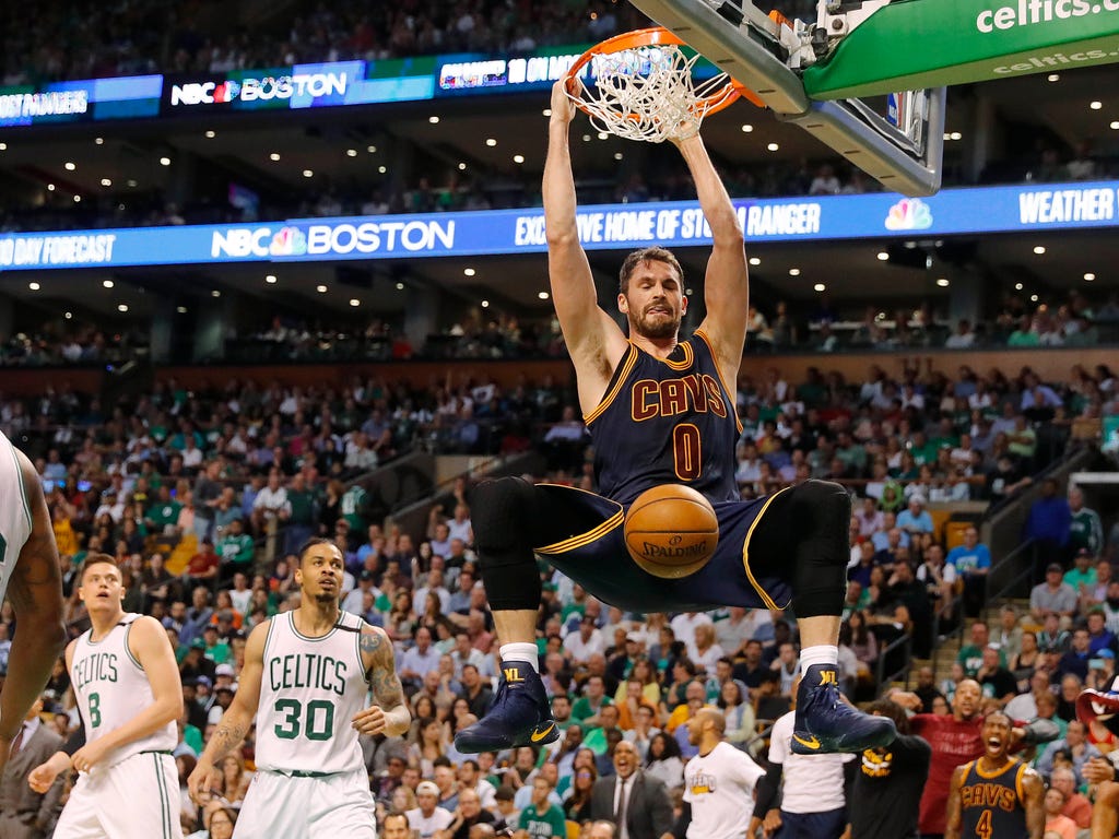 The Cleveland Cavaliers' Kevin Love dunks during a 130-86 demolition of the Boston Celtics during Game 2 of the Eastern Conference finals.