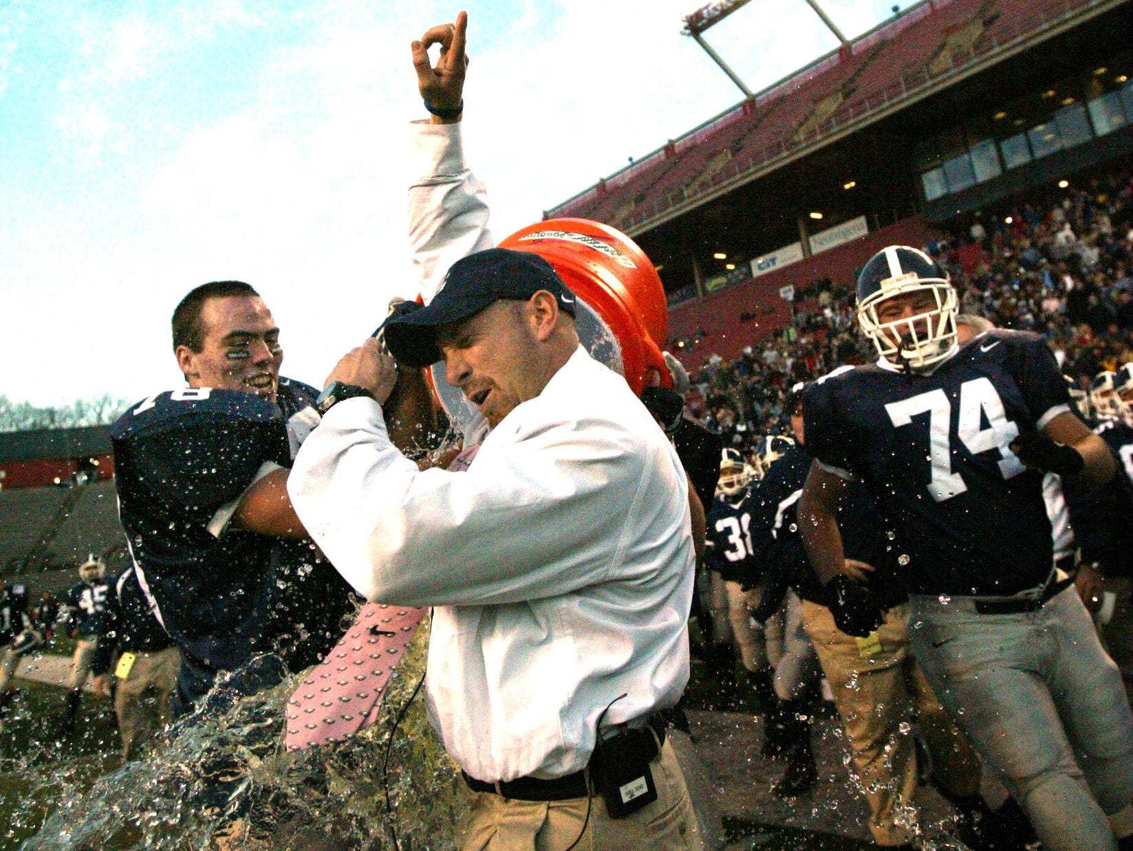 Middletown South's head coach, Steve Antonucci gets a Gatorade bath form his players after their state championship in 2006.
