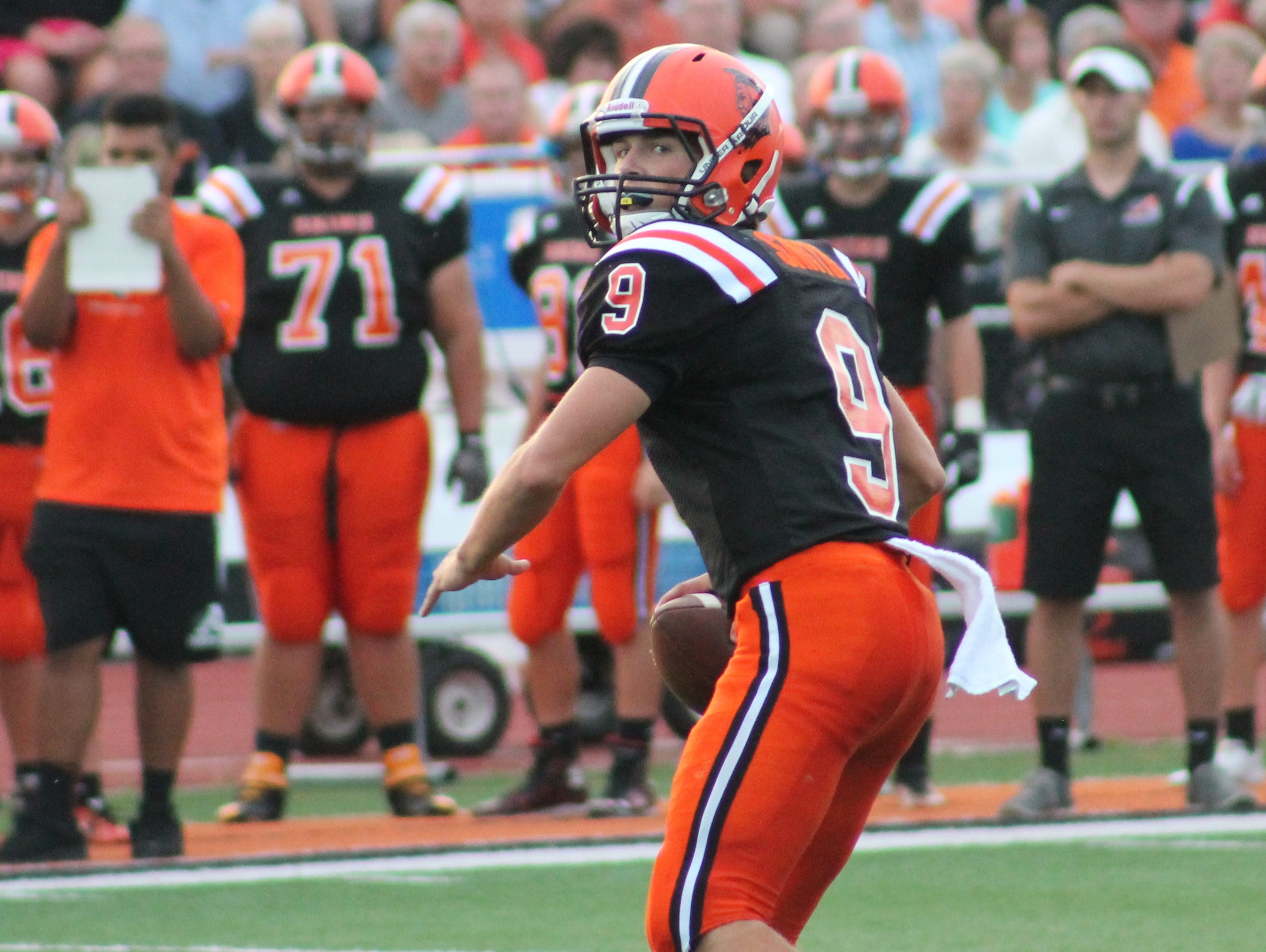 Anderson senior quarterback Dylan Smith looks for a receiver against Walnut Hills.