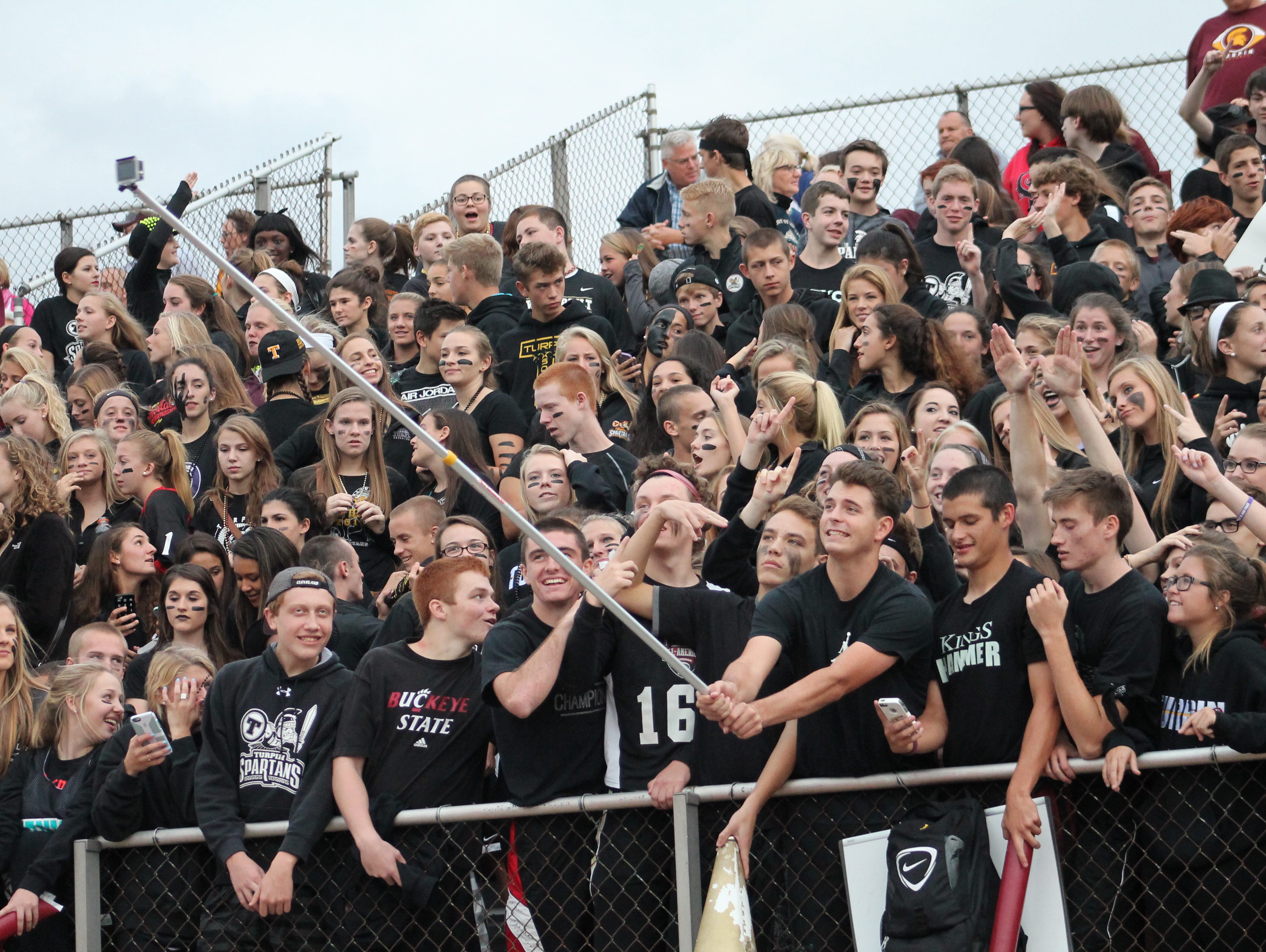 The Turpin student section tries a group "selfie" Oct. 9 before the Anderson game.