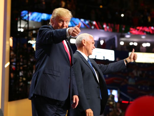 Trump and Pence give a thumbs-up after Trump