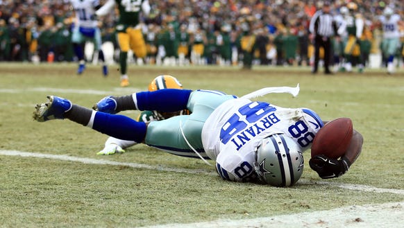 Cowboys wide receiver Dez Bryant (88) is unable to