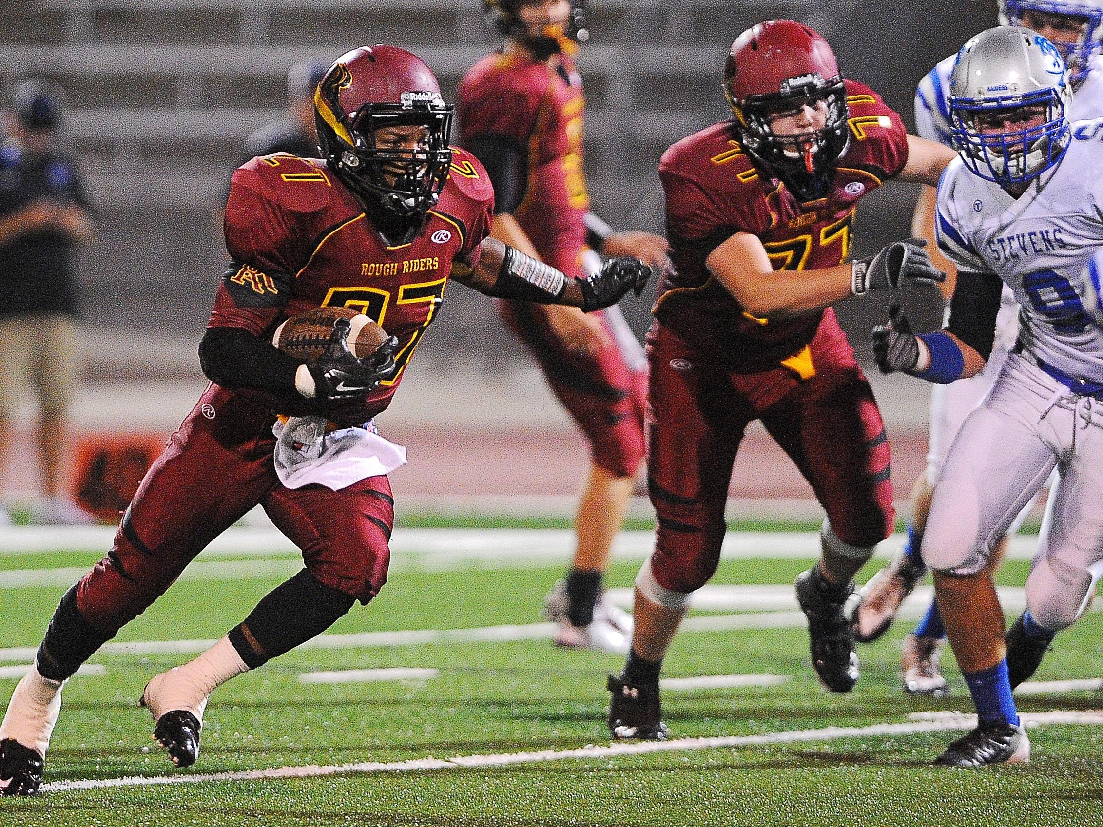 Roosevelt's Tyson Jahn looks for a hole as he carries the ball during a game against Rapid City Stevens.