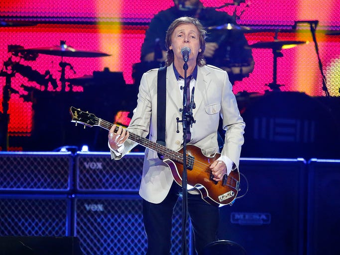 Paul McCartney performs during his 'Out There' world tour Tuesday, Aug. 12, 2014 at US Airways Center in Phoenix, Arizona.