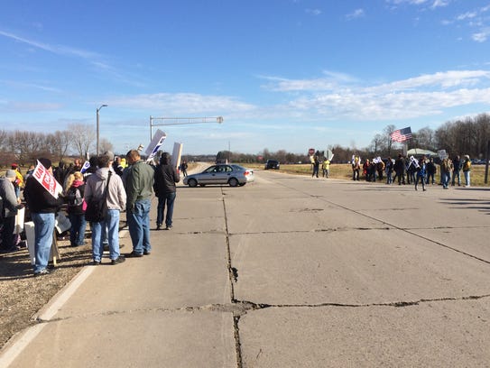 UAW Local 833 members and their supporters block a