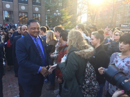Jesse Jackson talks to students during an anti-Donald