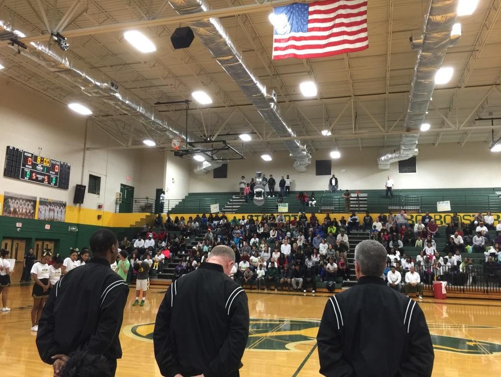Hillsboro High School held a moment of silence before the start its game Tuesday night to honor basketball player LeVonzell "L.T." Taylor, who died over the weekend.