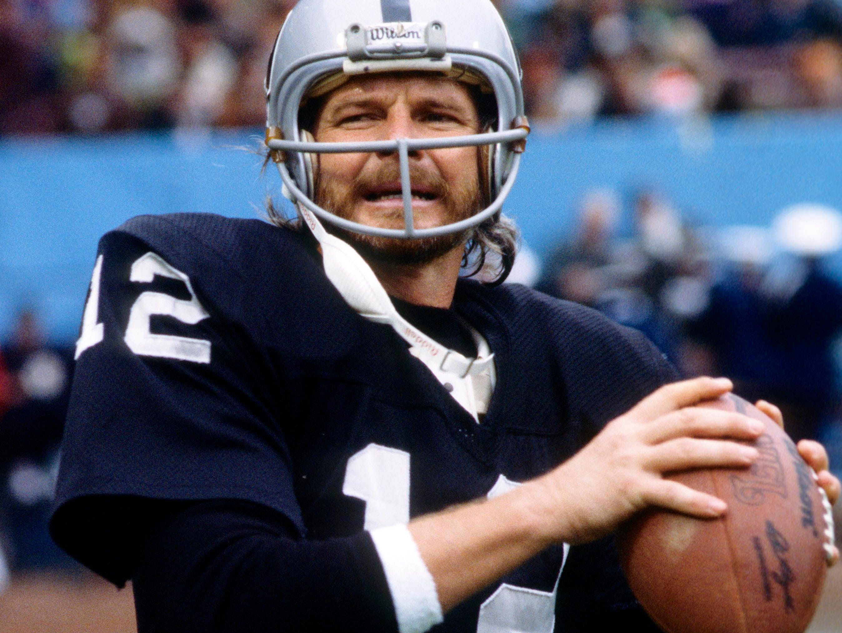 October 1977; Oakland Raiders quarterback Ken Stabler prepares for a game.
