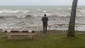 A man looks at the sea on March 14, 2015 in the Anse