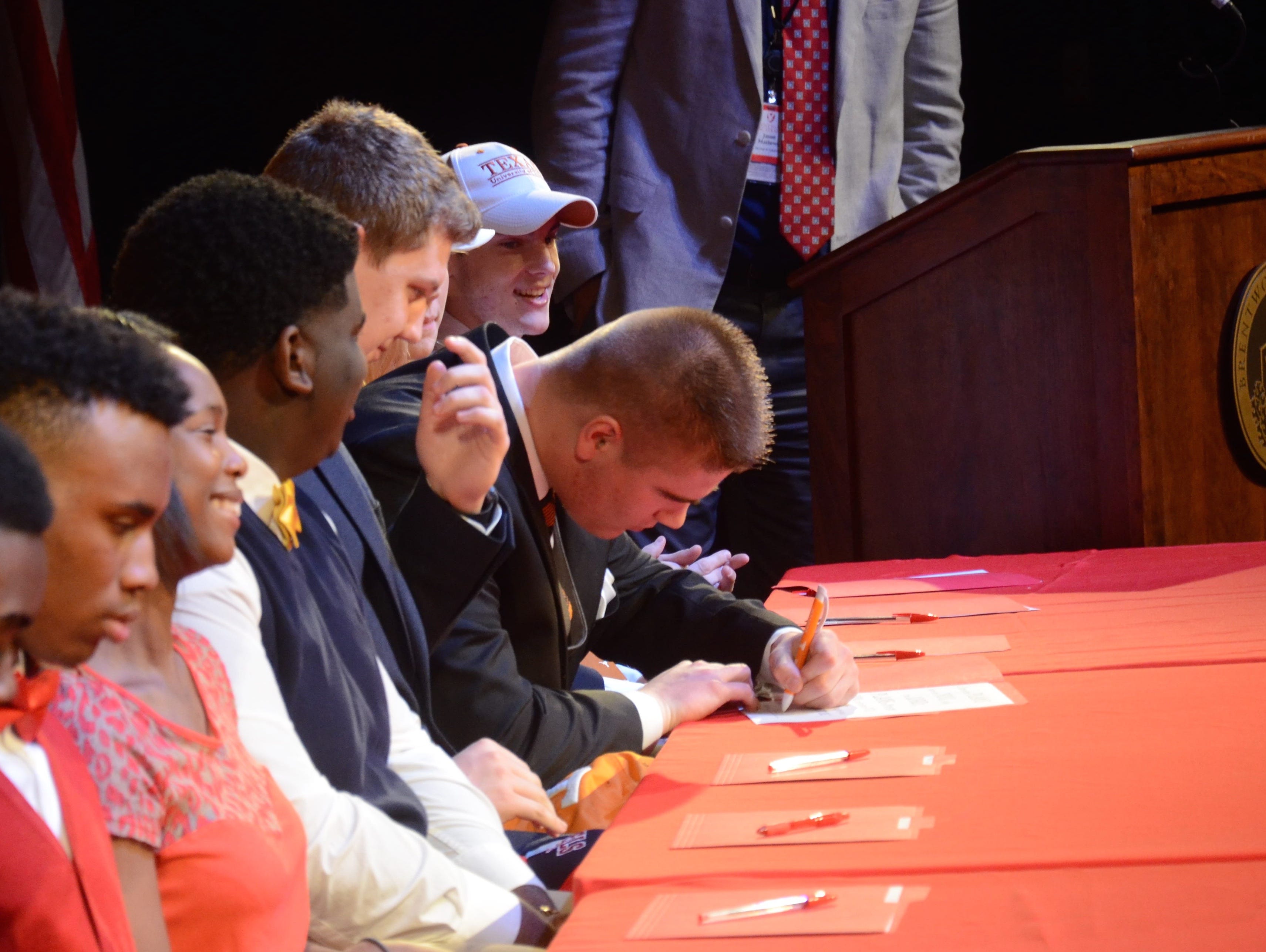 Brentwood Academy senior Ryan Johnson signs a letter of intent to play football at Tennessee.