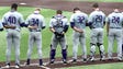 Washington players join with fans in a moment of silence