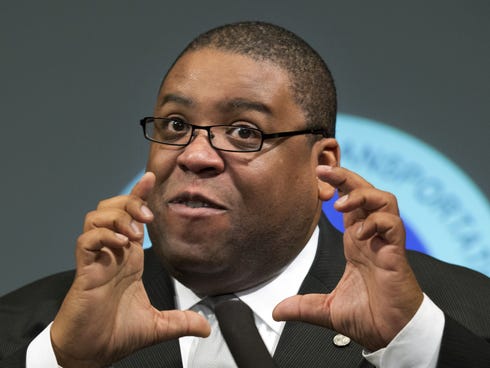 NHTSA Administrator David Strickland gestures during a news conference at the Transportation Department in Washington last year