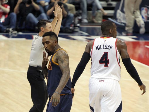 Cleveland Cavaliers guard J.R. Smith (5) reacts after