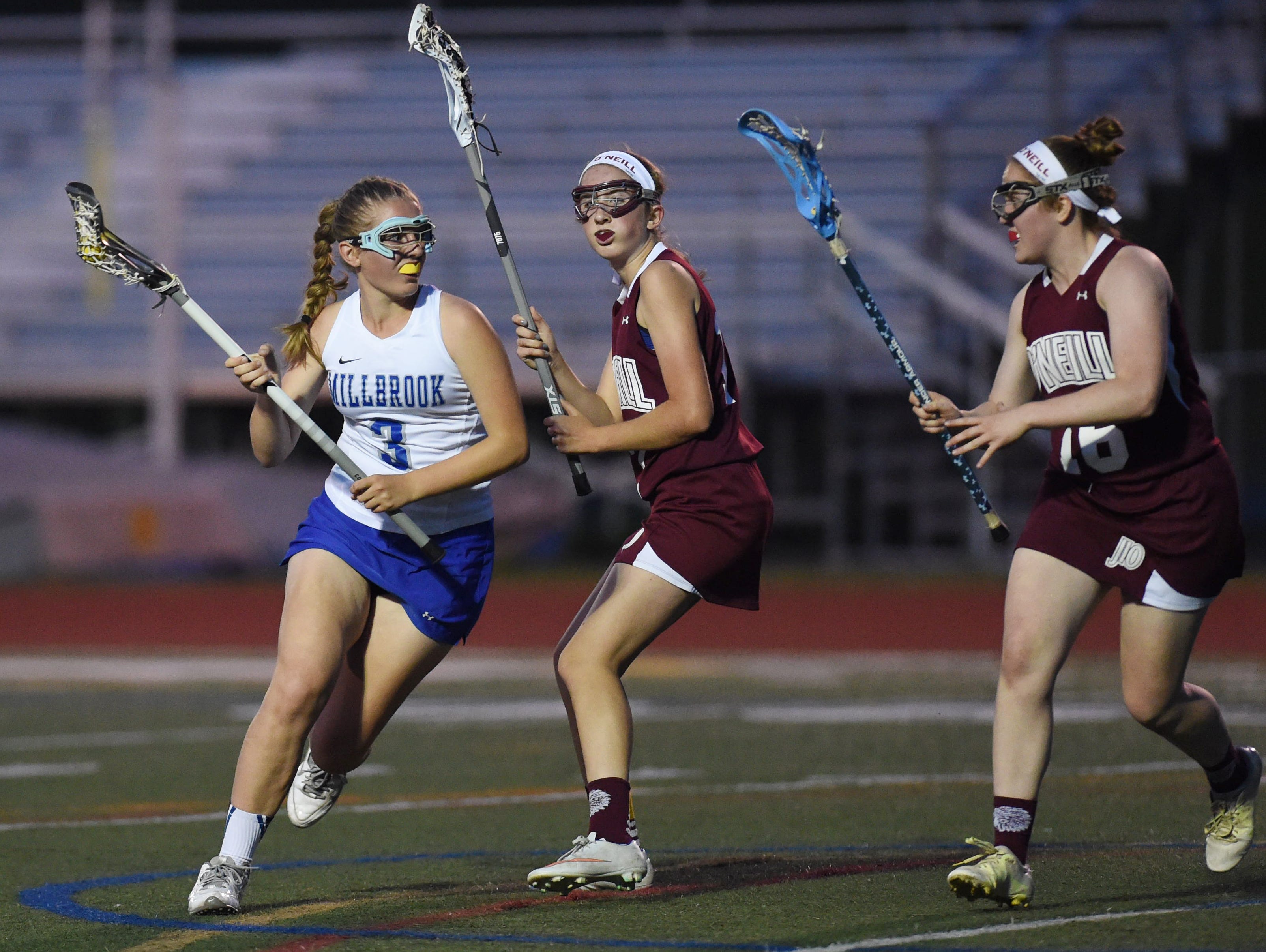 Millbrook's Sam Szalewicz drives against James I. O'Neill defense in the Section 9 Class C final.