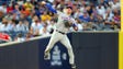 August  4: Mets shortstop Matt Reynolds throws to first