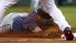 May 21: Mariners right fielder Nelson Cruz slides safely