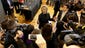 Clinton speaks to members of the media after meeting
