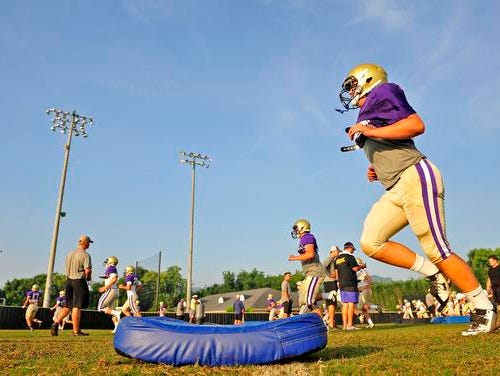 Christ Presbyterian Academy players go through drills during practice Monday.