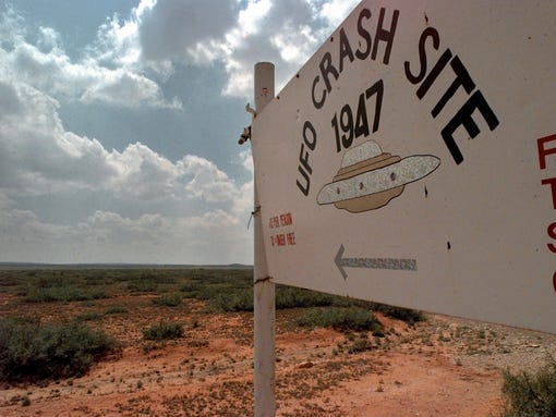 A sign directs travelers to the start of the "1947