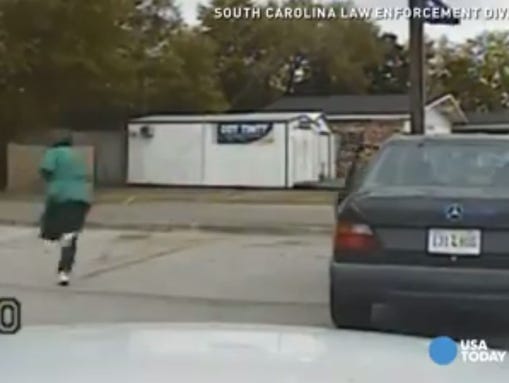 Walter Scott is seen fleeing his car in the moments