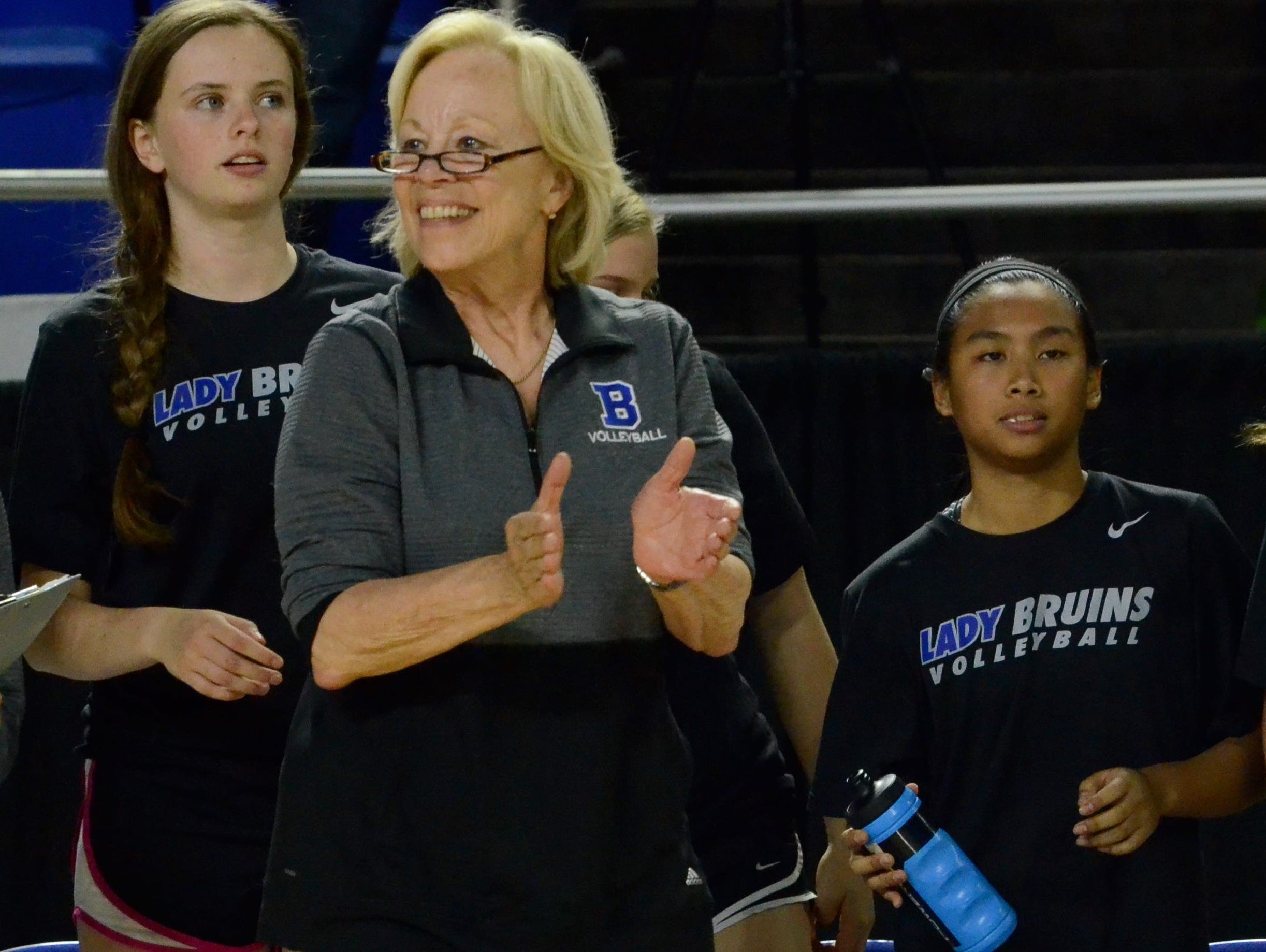 Brentwood coach Barbara Campbell encourages her team during Friday's Class AAA title match against Farragut.