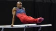 John Orozco competes on the parallel bars during the