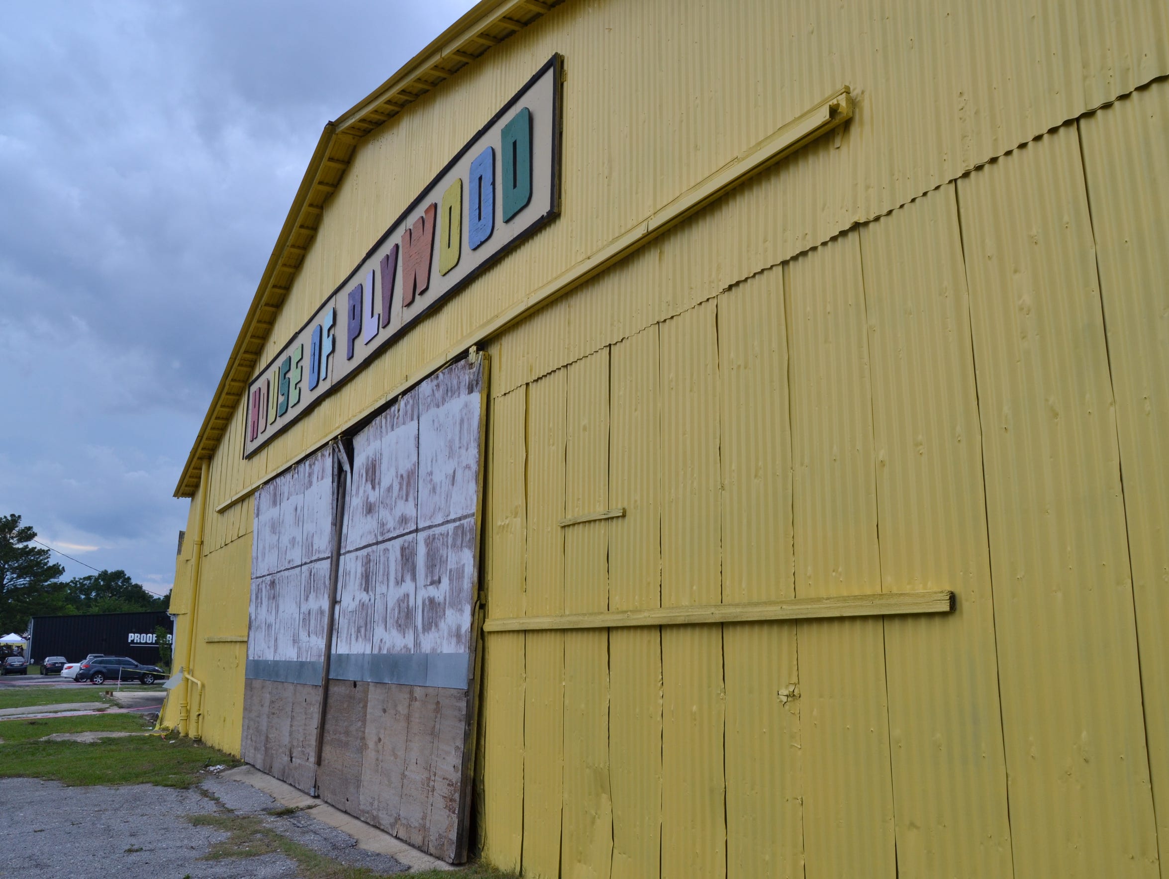 Fresh yellow paint adorns a warehouse in Railroad Square.