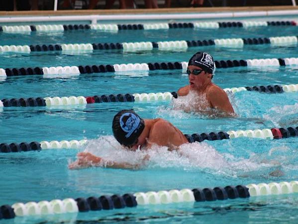 Maclay swimmer Rafi Chambasian tries to catch a North Bay Haven swimmer during a meet Wednesday.