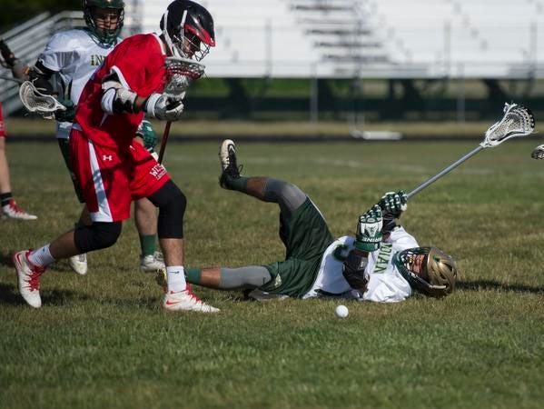 Indian River’s Nicolas Perez Urzua is knocked down in a game against Wilmington Christian on Friday, May 15, in Dagsboro.
