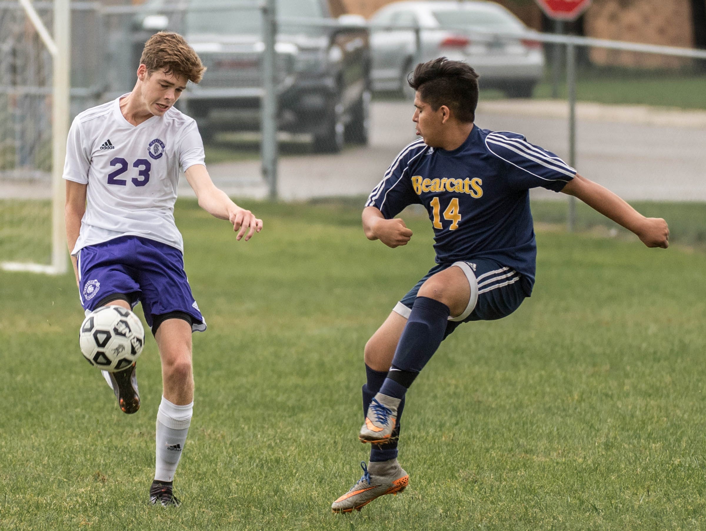 Lakeview's Cooper Grosteffon (23) and Battle Creek Central's Jose Chavez (14) during the All-City Soccer Championship on Saturday.