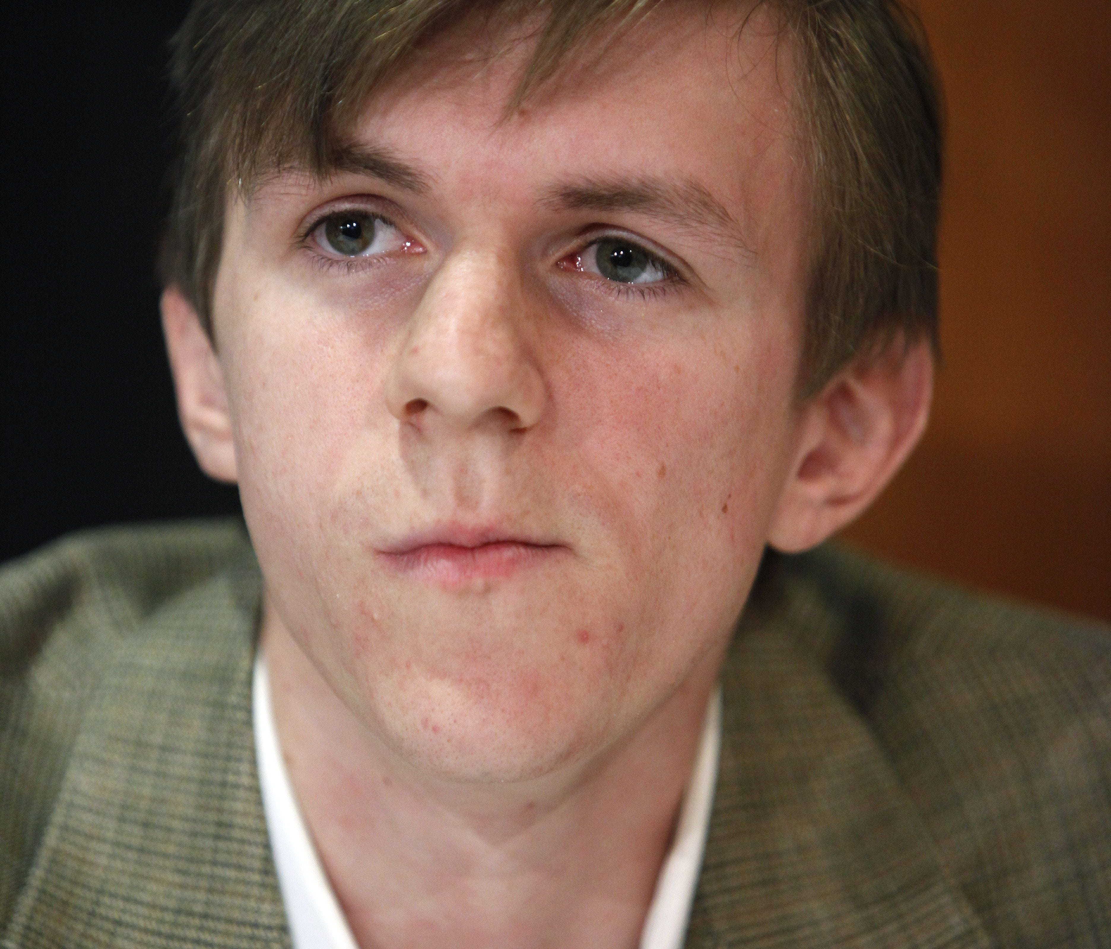 James O'Keefe attends a news conference at the National Press Club in Washington.