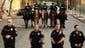 Baltimore Police mounted officers stand at the ready
