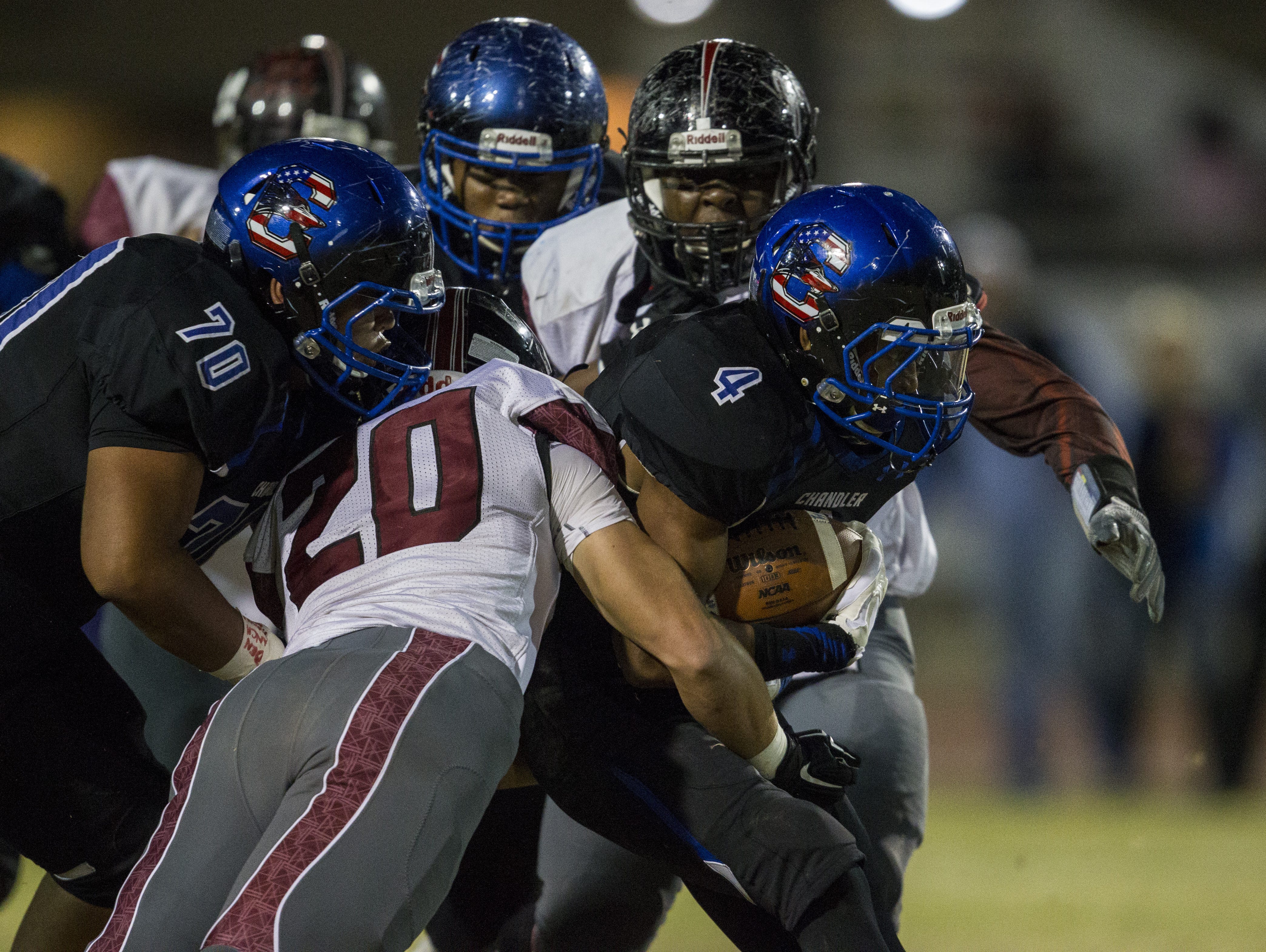 Chandler's T.J. Green rushes against Desert Ridge in the first quarter on Friday, Nov. 20, 2015 during the Division I state semifinals at Hamilton High School in Chandler, Ariz.