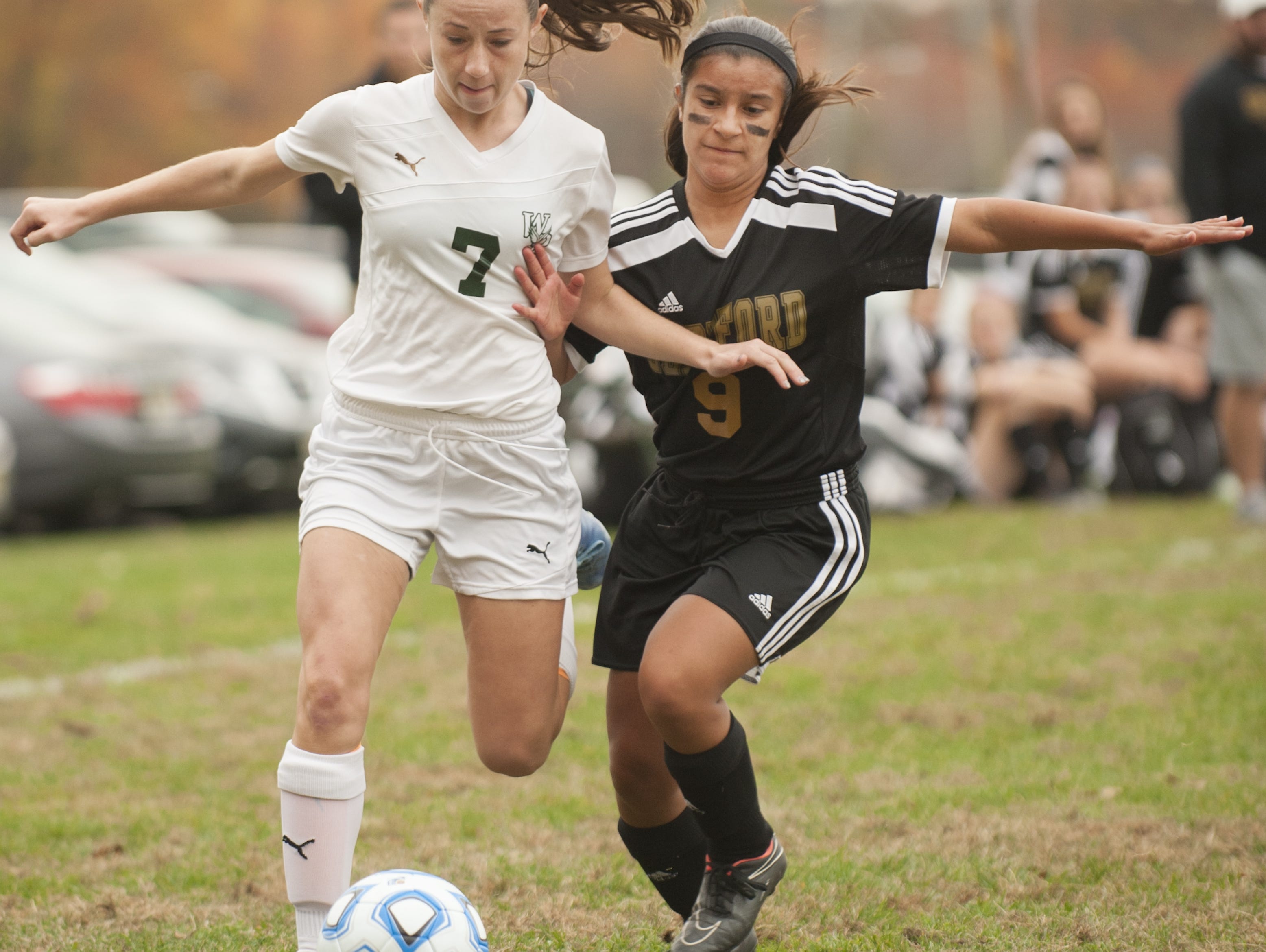 West Deptford's Emma Blades (left) and Gaby Gonzalez battle for the ball during the first half of Monday's South Jersey Group 2 playoff game.